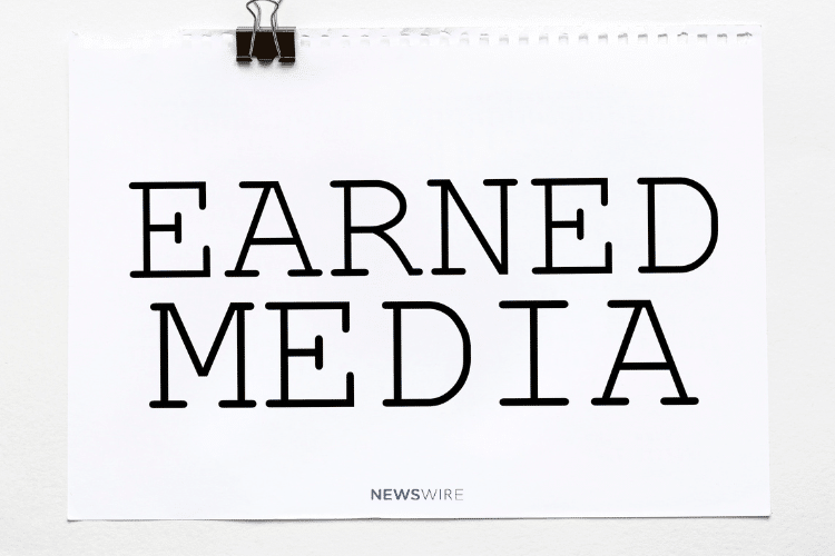 Newswire-branded image that says Earned Media